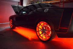 A car with LED wheel rings