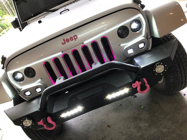 LED lights on the grill of a real life Barbie Jeep