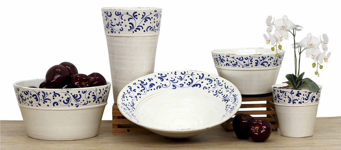 The Nuova Toscana Volute Collection is a brand new and Artistica's exclusive design of a transitional collection featuring traditional Blue Tuscan motifs (volute) depicted on fashionable and up-to-date vessels. Individually handmade and hand painted in Montelupo, Tuscany. Each piece of this collection is masterfully hand painted. Double fired and fully glazed inside and out, they hold water and are great for arranging flowers or as tabletop. Designed for decorative use but suitable to hold fruits, nuts and of course plants and flower arrangements.