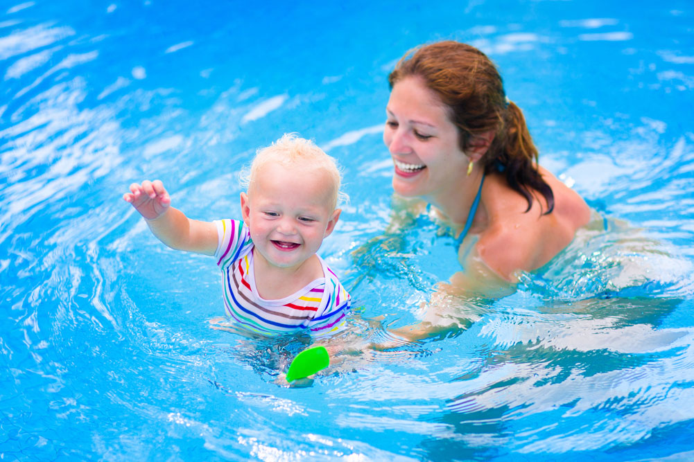 bigstock-Mother-And-Baby-In-Swiming-Poo-81203321