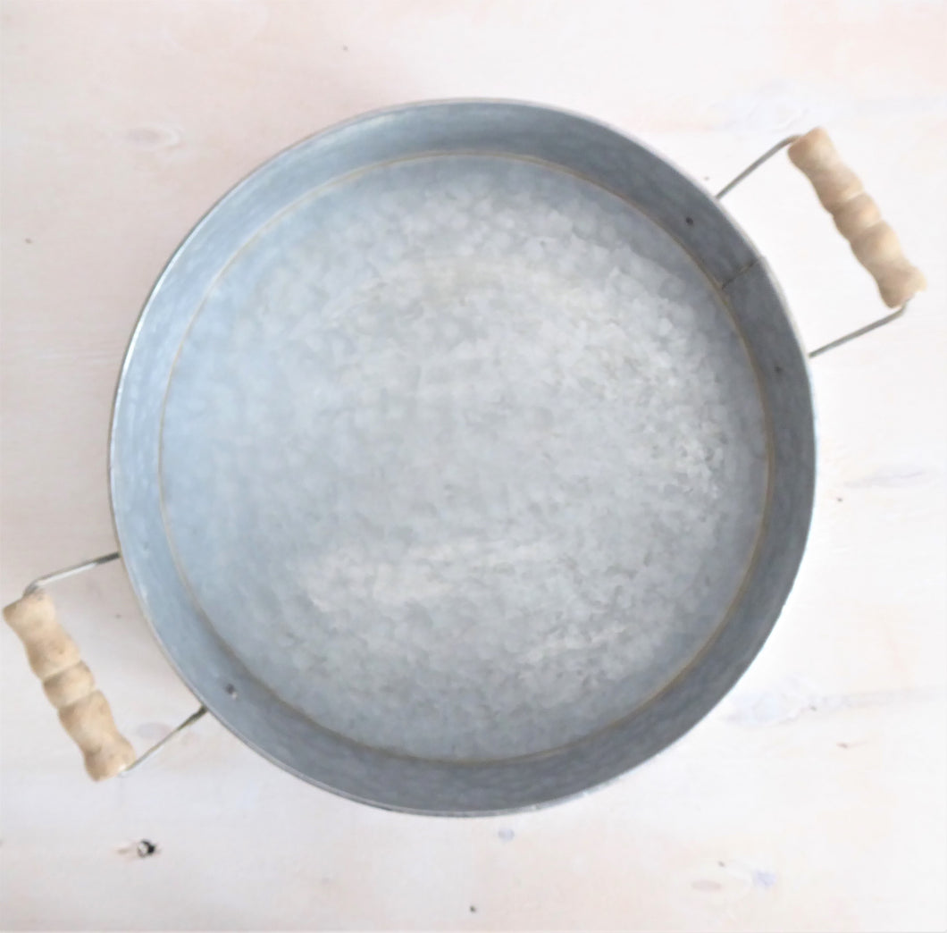 round metal tray with handles
