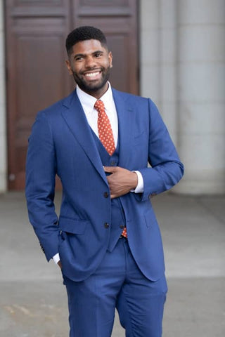 Attractive man wearing british elegant suit in the street. Modern hairstyle  stock photo (184560) - YouWorkForThem