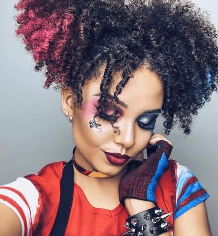 Halloween hairstyles for afro hair: Afro Pigtails: Harley Quinn with afro hair