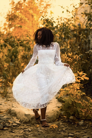 Afrocenchix Wedding Hairstyles for Natural Hair Pexels black woman dancing in wedding dress in nature