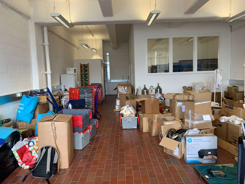 The Afrocenchix office with moving boxes 