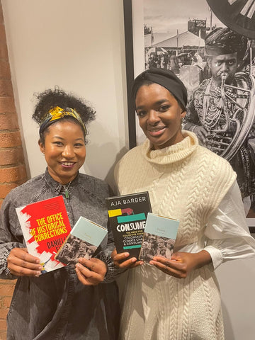 Jeanette and Cleide From Afrocenchix holding books from the Afrocenchixs Book Lovers Box