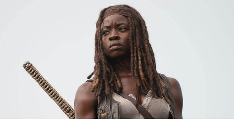 Halloween hairstyles for black hair: Locs and headband: Michonne from The Walking Dead