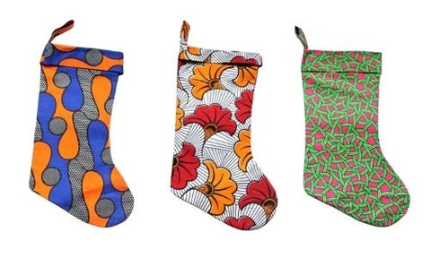 Three of TinyTuLondon's African print-inspired Christmas Stockings