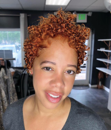 shaddah_elyse with short pumpkin spice coloured short curly hair