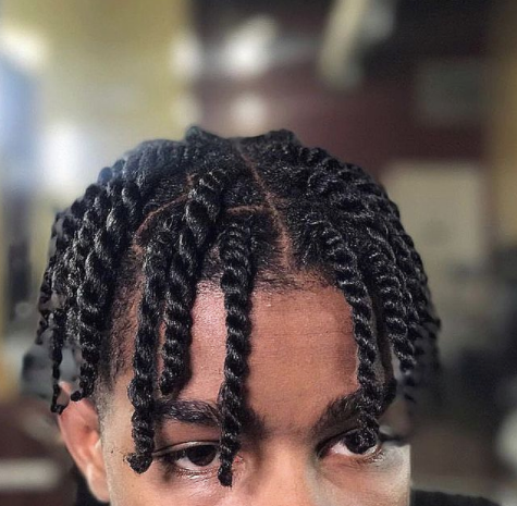 top of a black man's head with twisted hairstyle