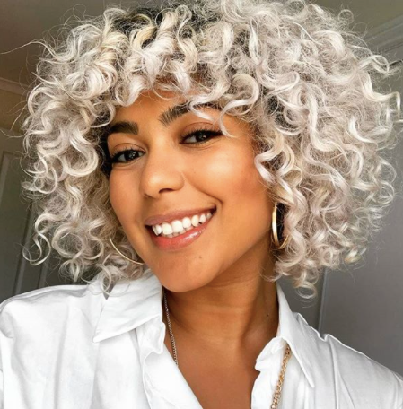 thecurlsguide smiling woman with curly grey hair