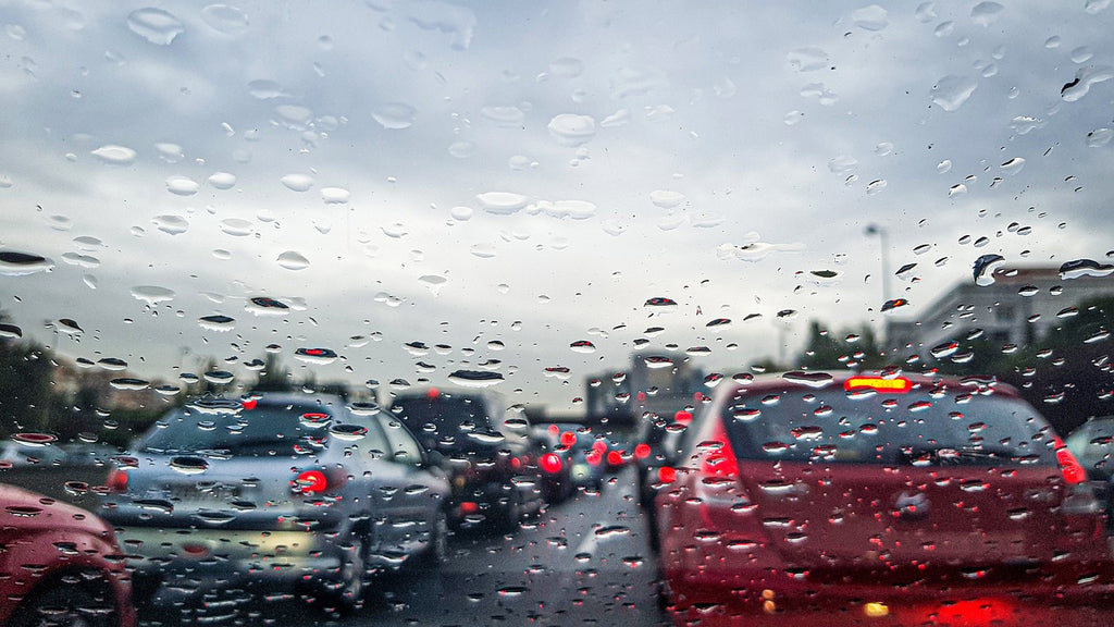 Rainy Windshield in Traffic Brakes Working