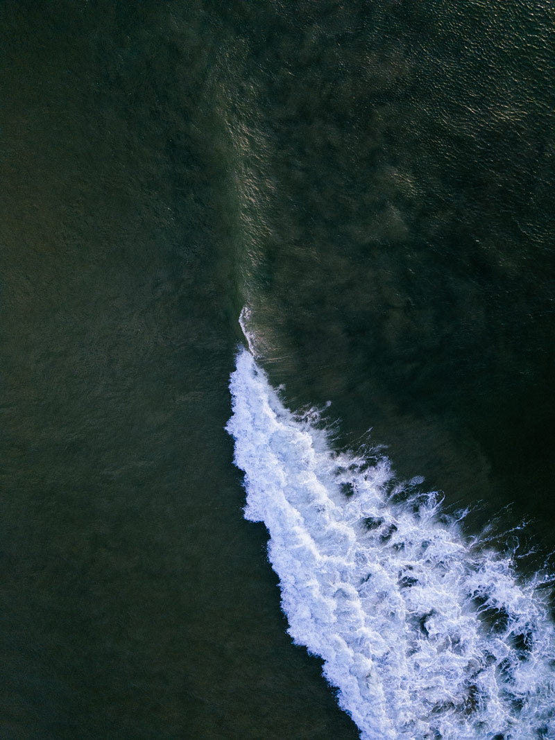 Aerial photo of waves in Tamarindo Costa Rica. Wave art pictures photographed by Kristen M. Brown, Samba to the Sea for The Sunset Shop.