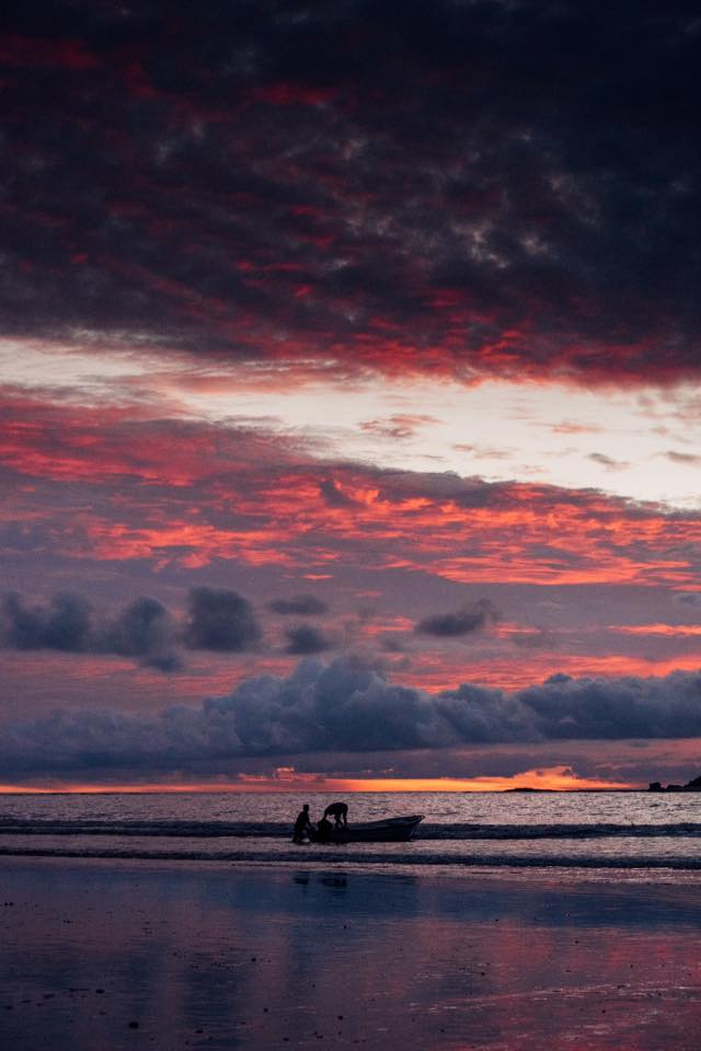 Fisherman at sunset in Tamarindo Costa Rica. Photographed by Kristen M. Brown, Samba to the Sea for The Sunset Shop.