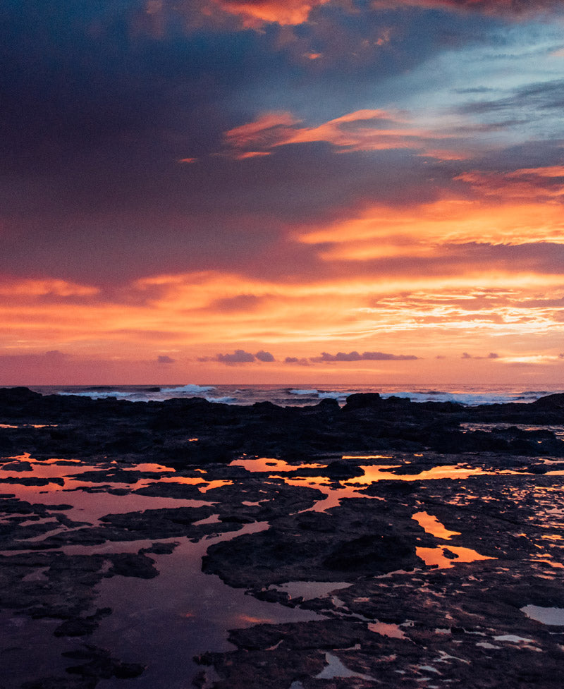 Sunset low tide pool reflections over the Pacific Ocean in Costa Rica. Photographed by Kristen M. Brown, Samba to the Sea for The Sunset Shop.