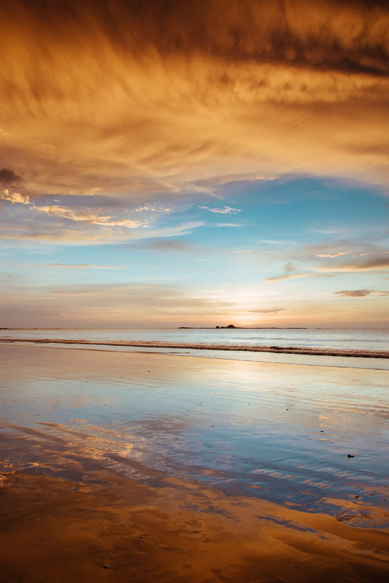 Sunset sky over the Pacific Ocean in Tamarindo Costa Rica. Photographed by Kristen M. Brown Samba to the Sea.