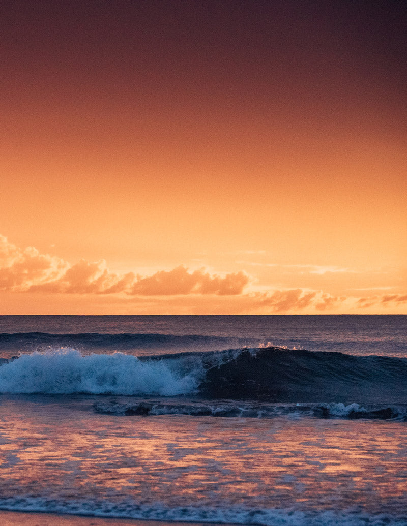 Waves breaking during a gorgeous sunset in Costa Rica. Photographed by Kristen M. Brown, Samba to the Sea for The Sunset Shop.