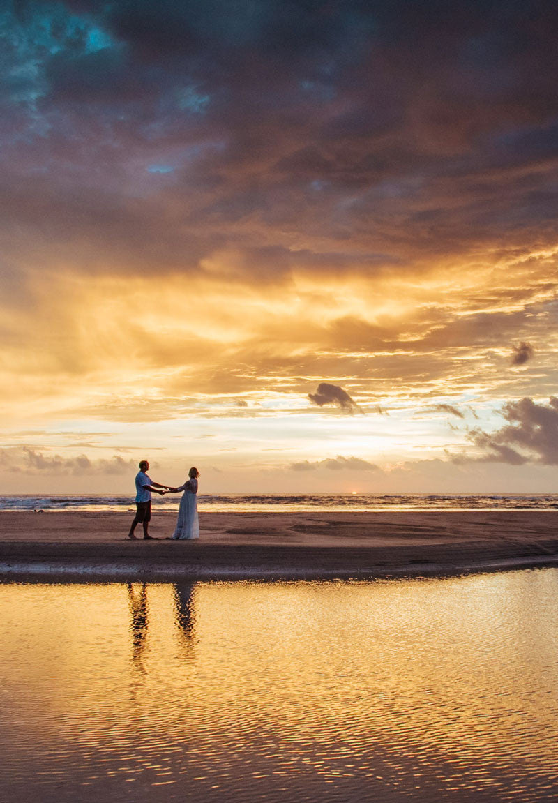 Costa Rica elopement at sunset in Tamarindo Costa Rica. Photographed by Kristen M. Brown Samba to the Sea.