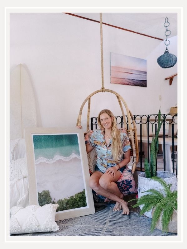 Destination Costa Rica photographer Kristen M. Brown at home with her sunset and beach photography prints. Boho surf shack in Tamarindo, Costa Rica. Samba to the Sea for The Sunset Shop.