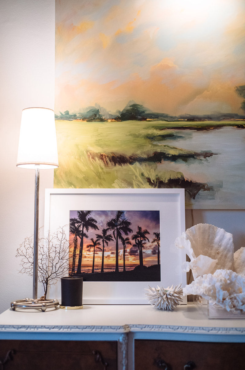 Coastal decor with coral, marsh painting and a sunset palm tree print. Palm Tree sunset print Ocean Grown. By Samba to the Sea for The Sunset Shop.