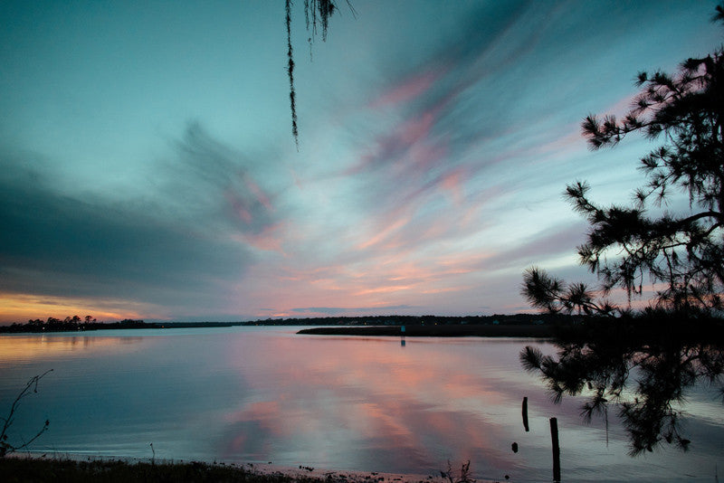 Sunset over Moon River in Savannah Georgia. Photographed by Kristen M. Brown, Samba to the Sea.