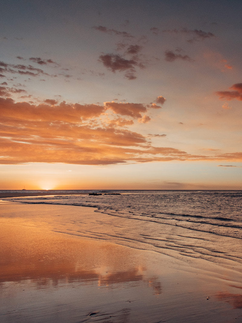 Sunset at the beach in Tamarindo Costa Rica. Sunset art pictures photographed by Kristen M. Brown, Samba to the Sea for The Sunset Shop.