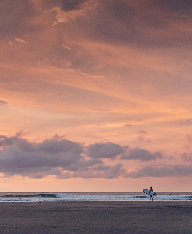 Surfer girls on the beach during a pretty sunset in Tamarindo Costa Rica. Photographed by Kristen M. Brown, Samba to the Sea for The Sunset Shop.