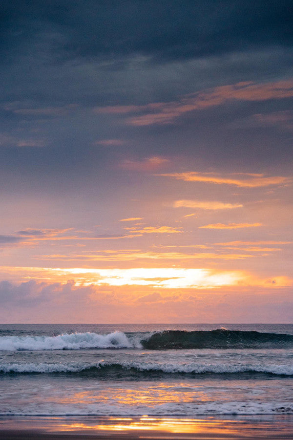 Peeling wave at sunset in Tamarindo Costa Rica. Photographed by Kristen M. Brown, Samba to the Sea.