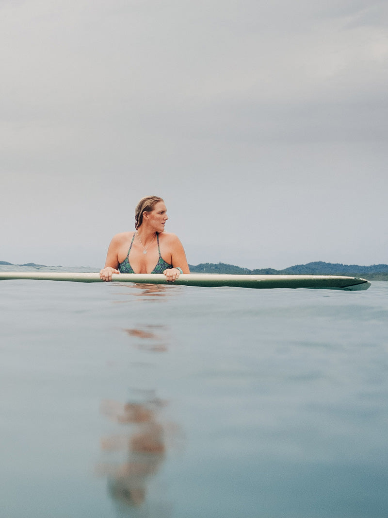 Surfer girl in Tamarindo Costa Rica. Photographed by Kristen M. Brown, Samba to the Sea for The Sunset Shop.