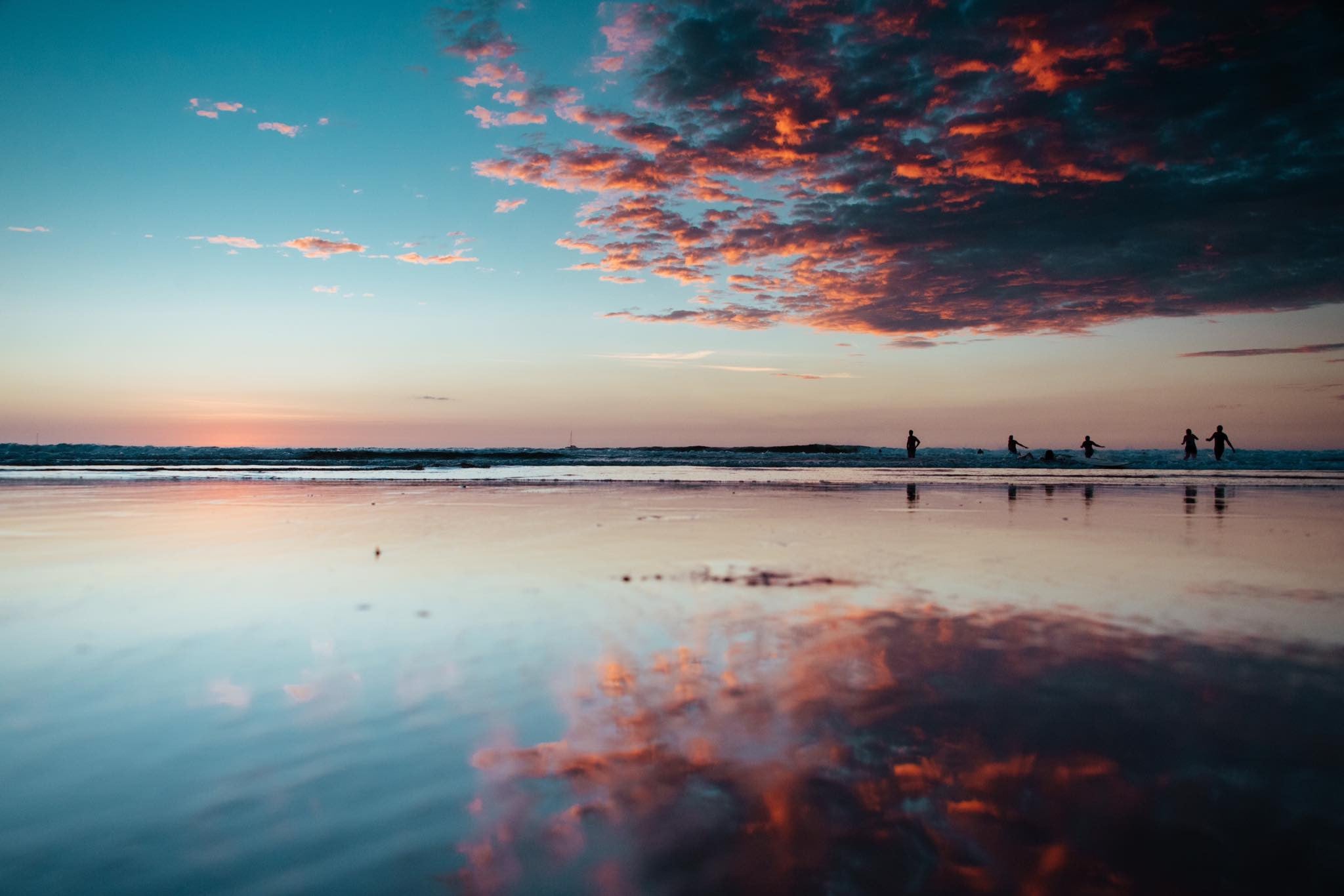 Gorgeous turquoise sunset in Tamarindo, Costa Rica. Photographed by Kristen M. Brown, Samba to the Sea. Sunset print available at The Sunset Shop.