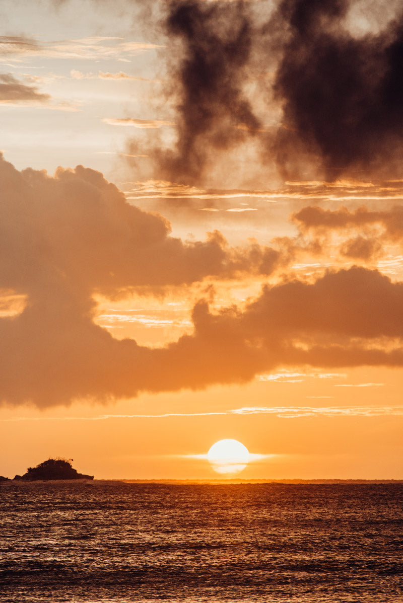 Sun passing over the Pacific Ocean in Costa Rica. Photographed by Kristen M. Brown, Samba to the Sea for The Sunset Shop.