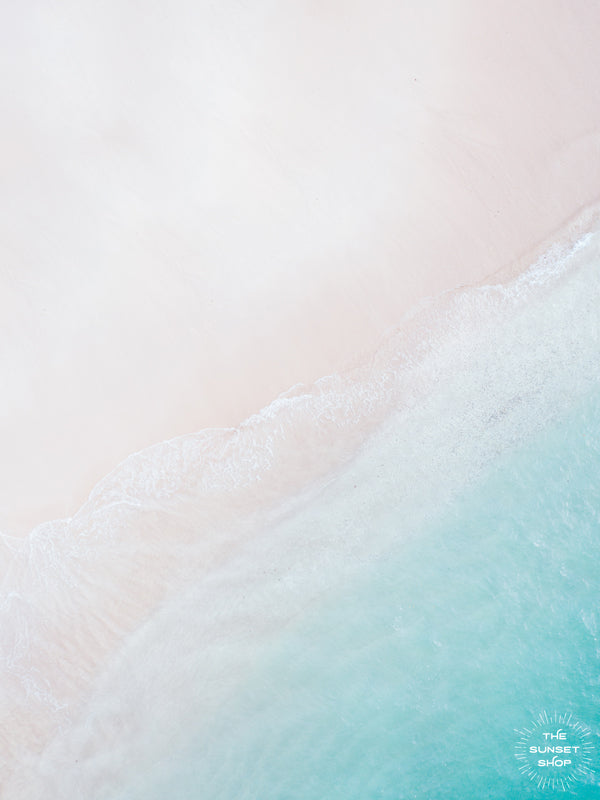 Aerial image of white sandy beach and turquoise ocean in Playa Conchal, Costa Rica. With the days merging together, the sun caressing your face, and the warm ocean touching your soul, you could be in Costa Rica, Hawaii, St. Barths, or around the world in Fiji. It doesn't matter, it's your paradise. Photographed by Kristen M. Brown, Samba to the Sea for The Sunset Shop.