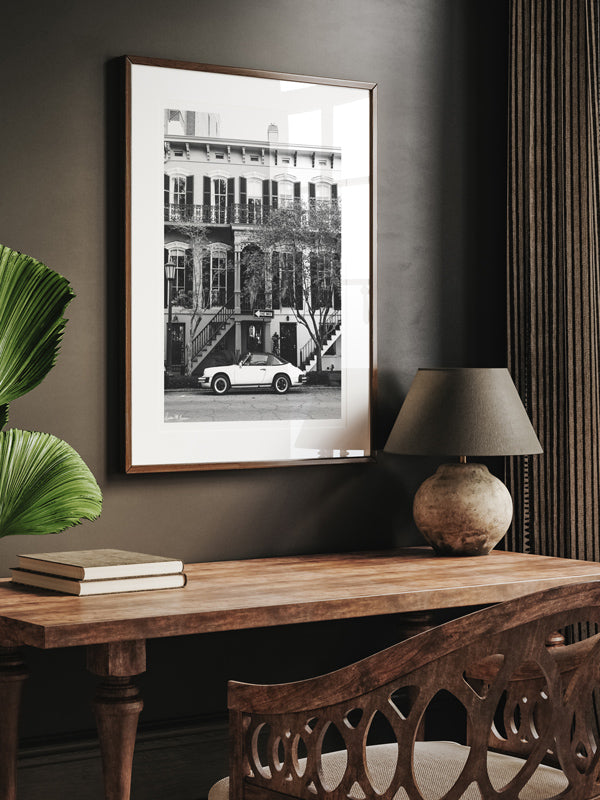 Porsche 911 parked in historic downtown Savannah Georgia hanging over desk. Porsche 911 black and white photo print by Kristen M. Brown of Samba to the Sea.
