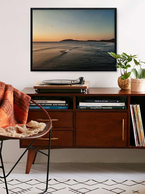 Aerial wave print by Samba to the Sea at The Sunset Shop. Image is an aerial photo of a wave breaking in Tamarindo, Costa Rica.