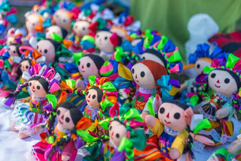handmade Mexican dolls on display at the San Jose del Cabo Organic Market