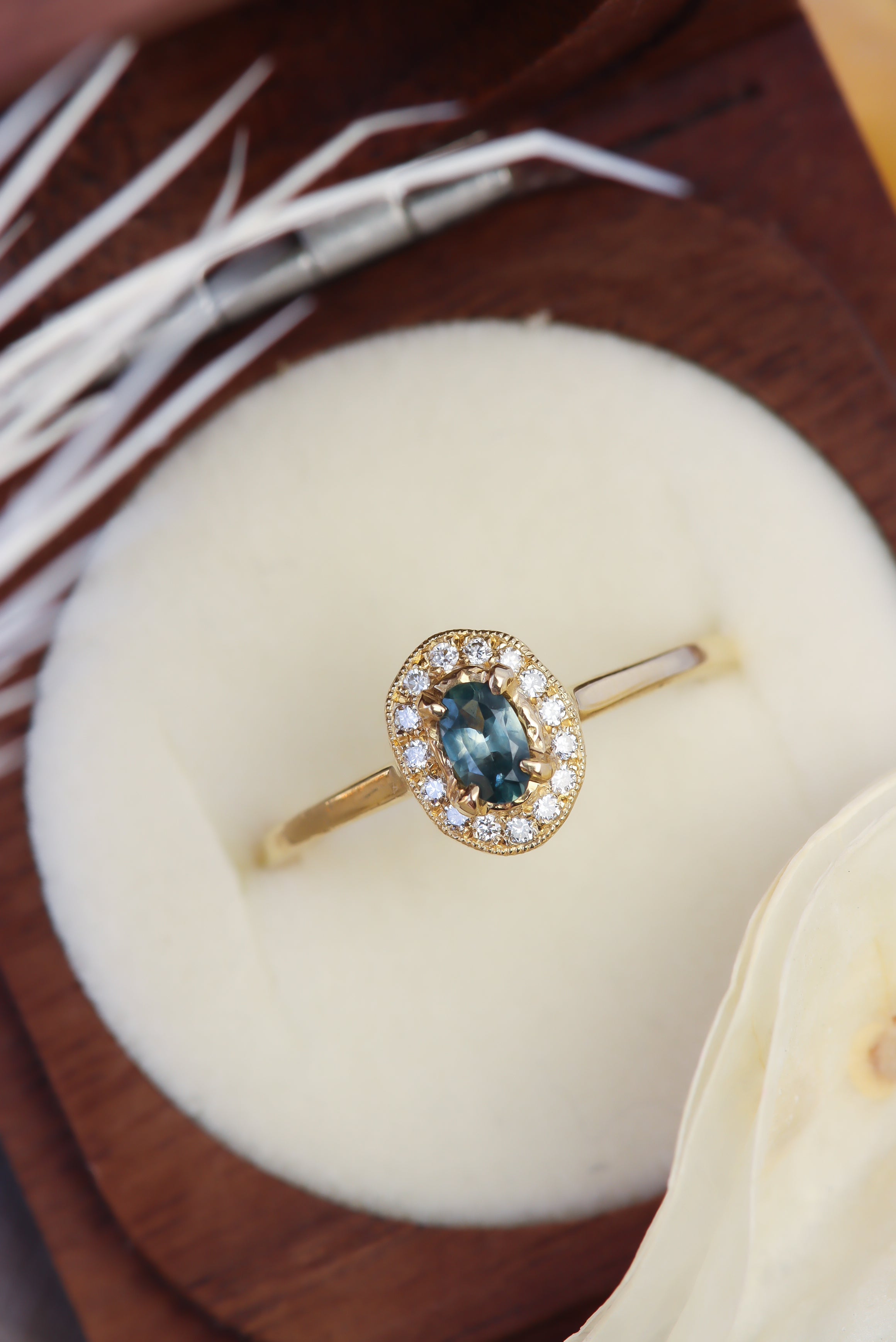 3-Unique-Earthy-Engagement-Ring-Styles-Inspired-By-Nature-sapphire-halo-ring