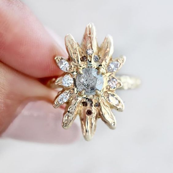 gold starburst ring with diamonds