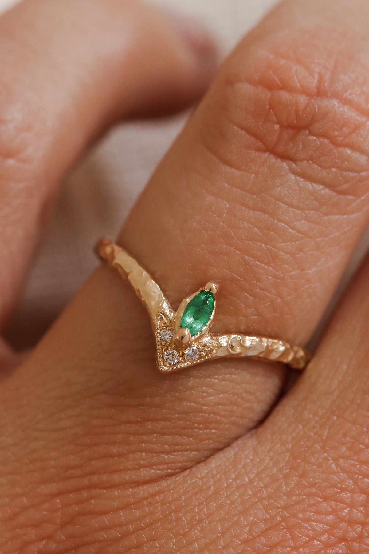 emerald-marquise-ring-hammered-chevron-band-diamond-milgrain