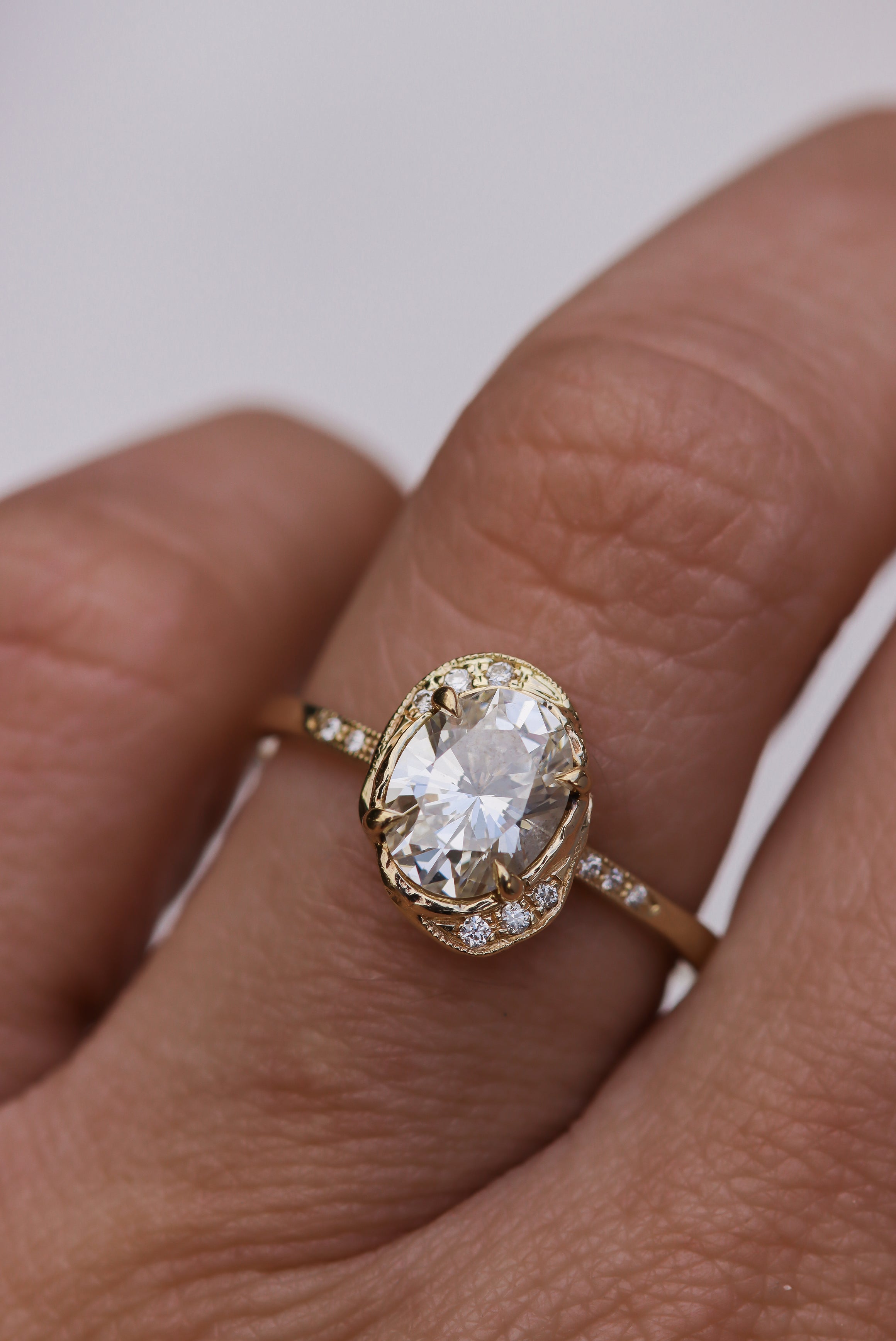 yellow-gold-oval-diamond-engagement-ring-unique.