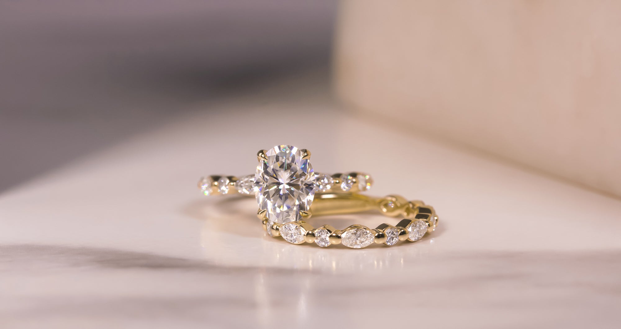 Kobelli Oval-cut Diamond & Moissanite Rings