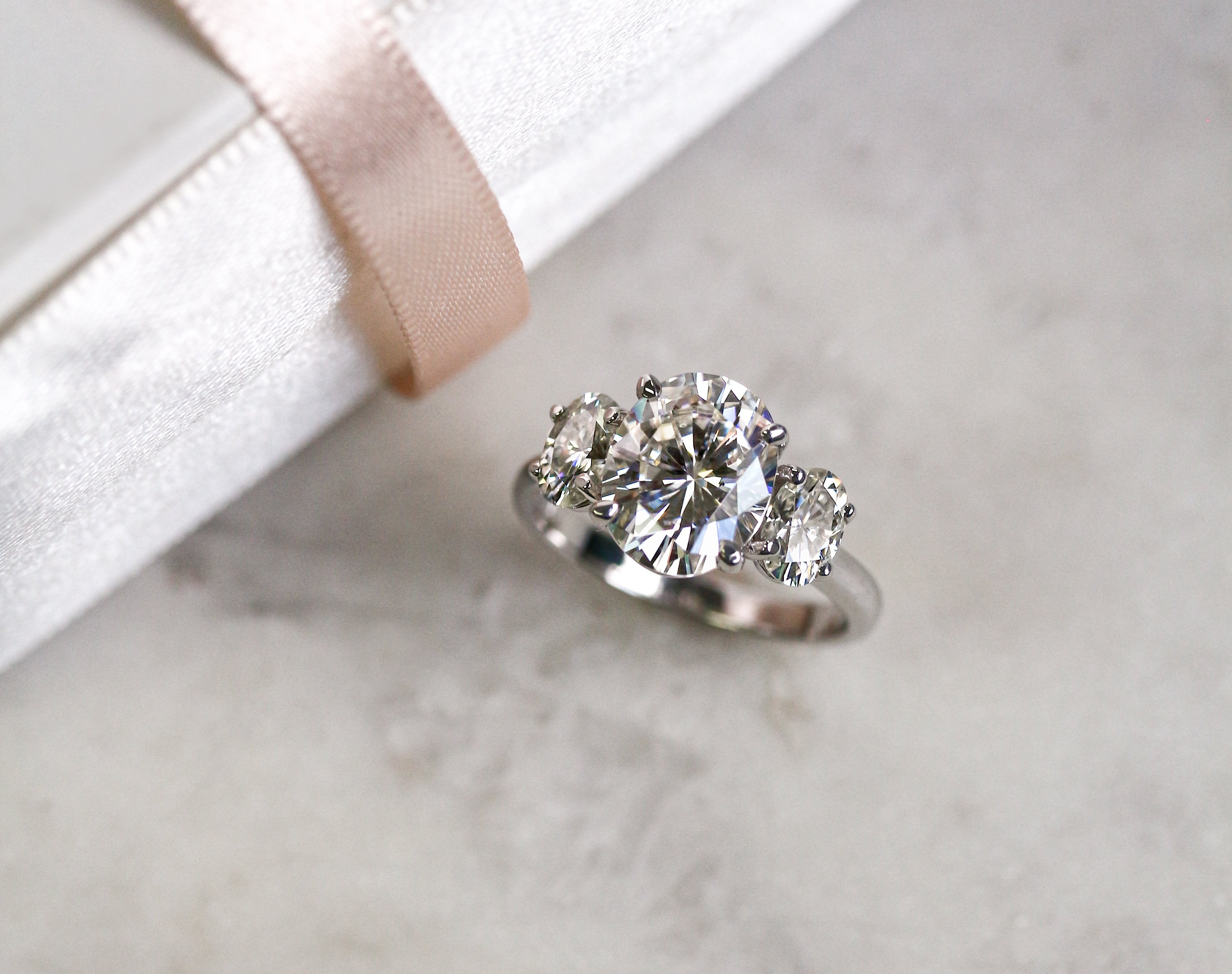 Kobelli Three-stone Oval Engagement Ring