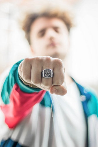 Young Man Posing With Silver Signet Ring