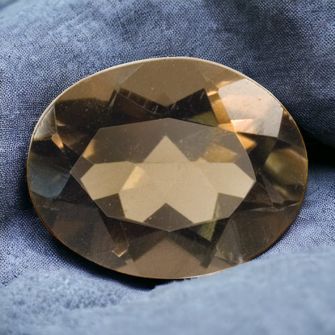An oval cut & faceted smoky Quartz gemstone image