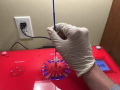 After collecting cells from the N.S. plate with the blue inoculating loop, gently dispose of them in the Transformation Buffer by rotating. Remember, the Transformation Buffer should be on the Cold Station during the entirety of this process!