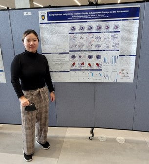 Rebecca, a former intern at Amino Labs, with her biology / biochemistry science poster. Science education, biology curriculum, models, modern biotechnology, genetic engineering,