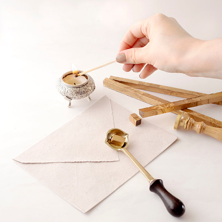 Melting Bank Of England Wax Sticks With Melting Spoon And Candle | Different Types Of Sealing Wax | Heirloom Seals