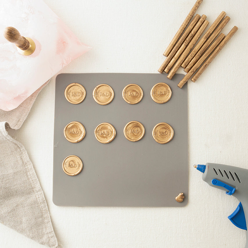 Wax Seals Being Stamped on a Silicone Mat  | How to Make Wax Seals | Heirloom Seals