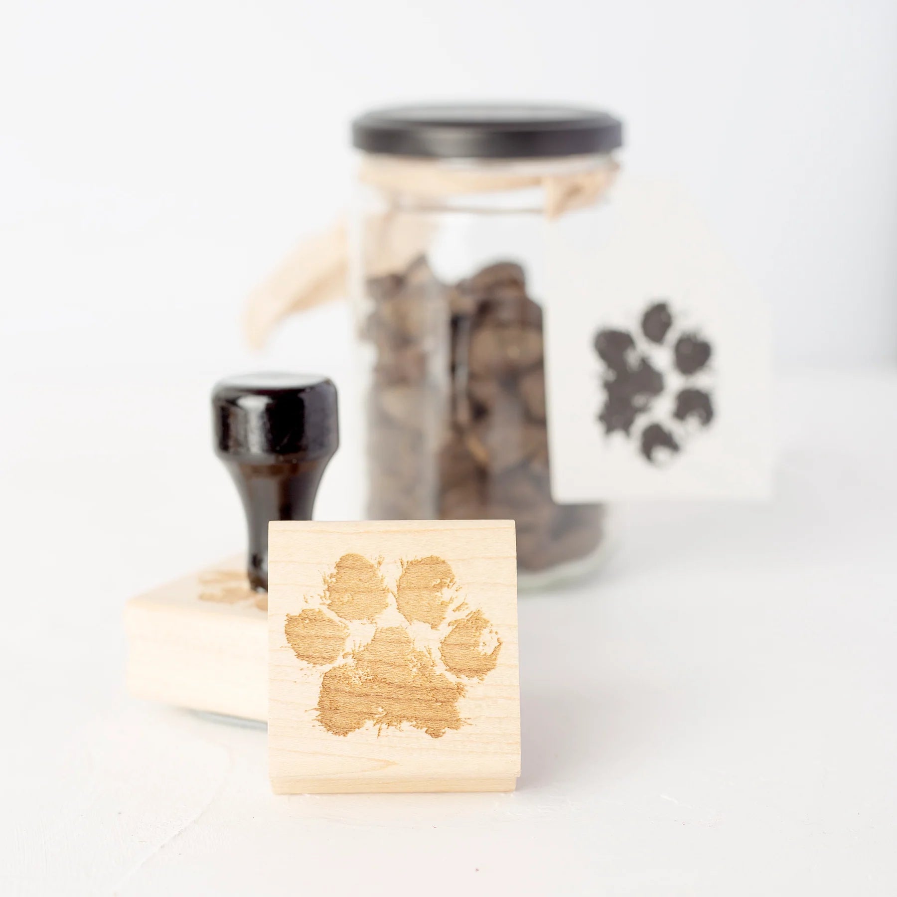 Doggie treat jar decorated with paw print gift tag | Heirloom Seals