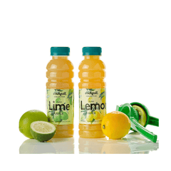 Two bottles of Cocktail Collective's Lemon Juice and Lime Juice with fresh fruit