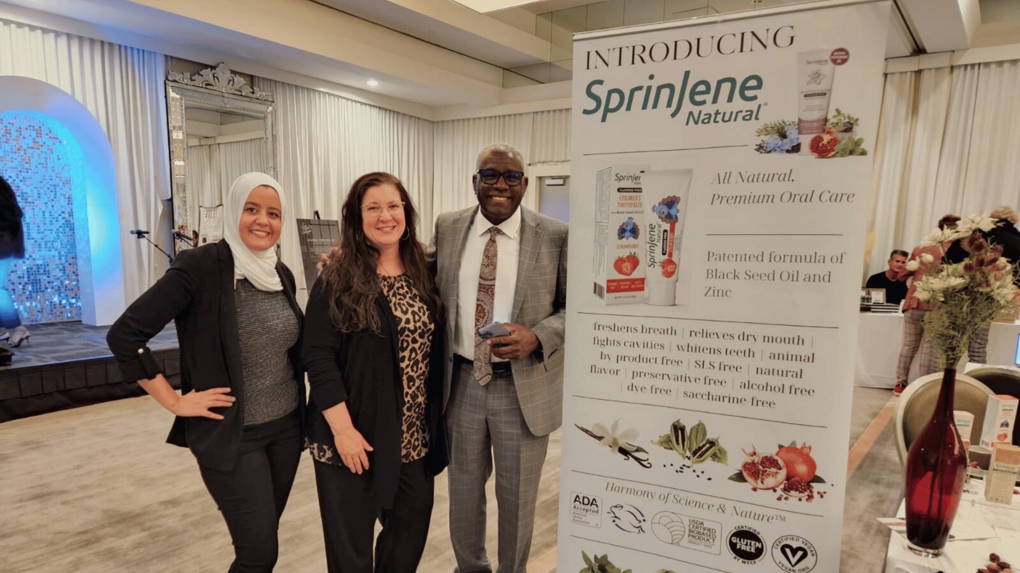 Dr. Sayed and others snapped photos at the SprinJene booth during the So Let's Shop event.